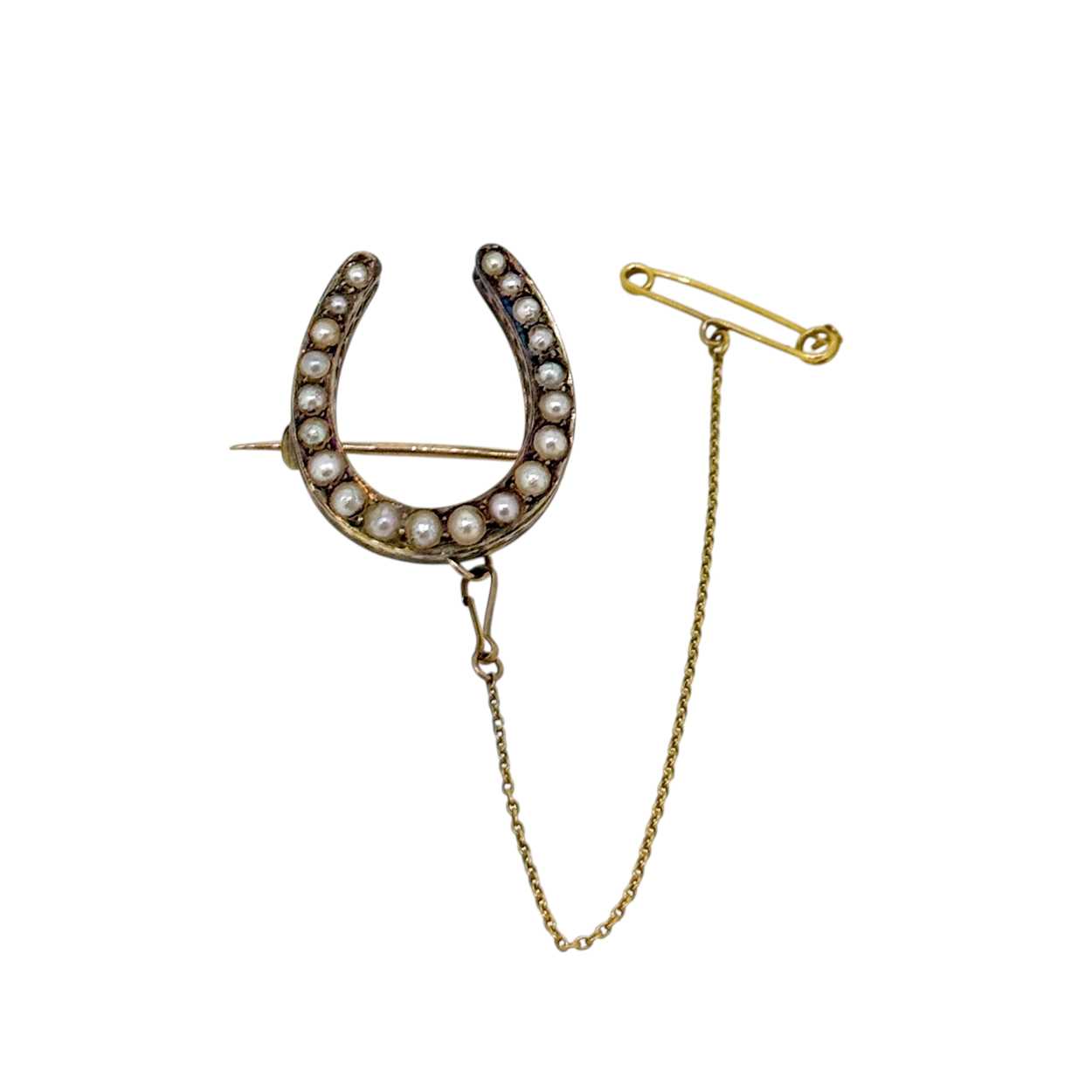 Lot 5 - A split pearl horseshoe brooch, dimensions 2.5...