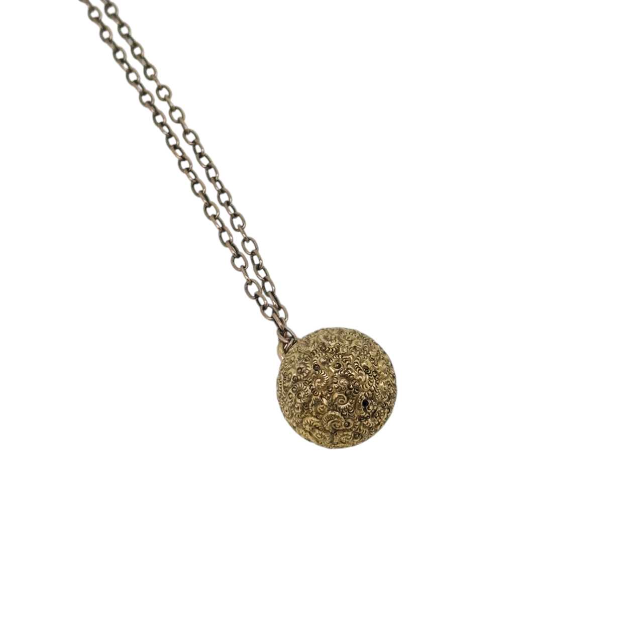 Lot 12 - A Victorian ball pendant and chain, pendant...