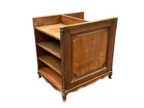 Lot 610 - A French walnut double sided bookshelf or book...