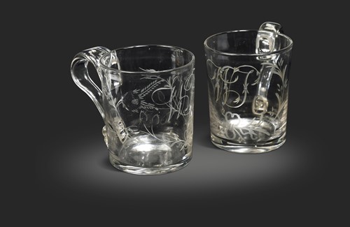 Lot 640 - Two glass mugs, 18th century