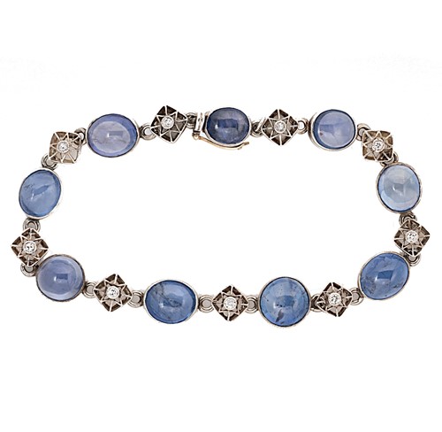 Lot 217 - An early 20th century cabochon sapphire and diamond bracelet