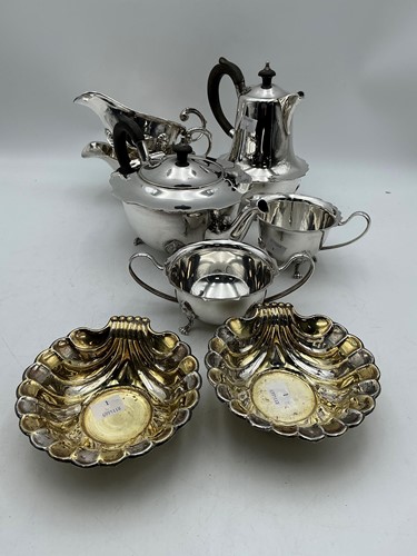 Lot 326 - A pair of two-tone precious metal butter...