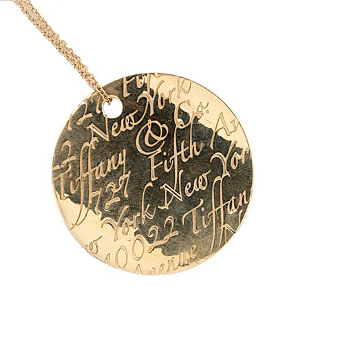 Lot 224 - Tiffany & Co. - A 'Notes' pendant and chain