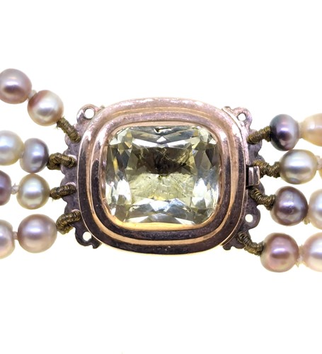 Lot 11 - A four row cultured freshwater pearl necklace