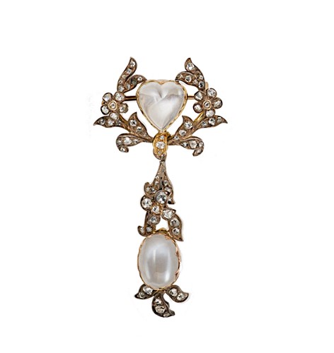 Lot 183 - An early 20th century moonstone and diamond floral brooch