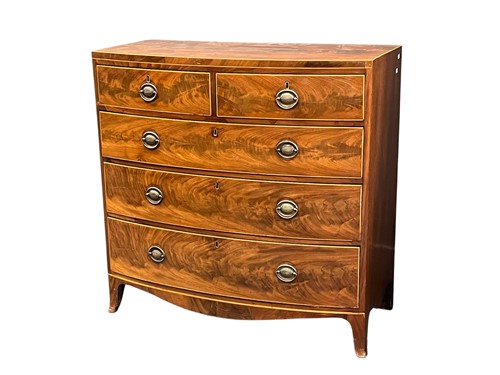 Lot 557 - A mahogany bow fronted chest of drawers, 19th...