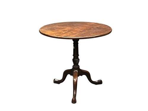 Lot 615 - A George III mahogany tripod table
