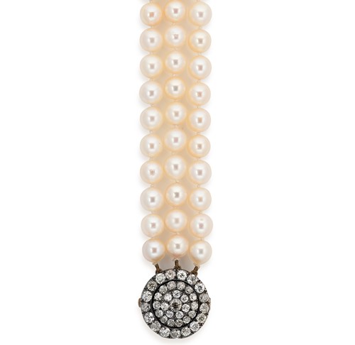 Lot 41 - A triple row cultured pearl necklace with a diamond cluster clasp