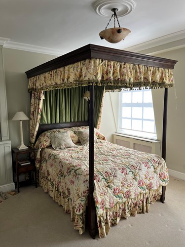Lot 552 - A mahogany four poster bed by Heal & Son, London