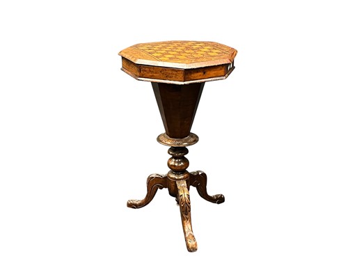 Lot 596 - A Victorian walnut octagonal work table
