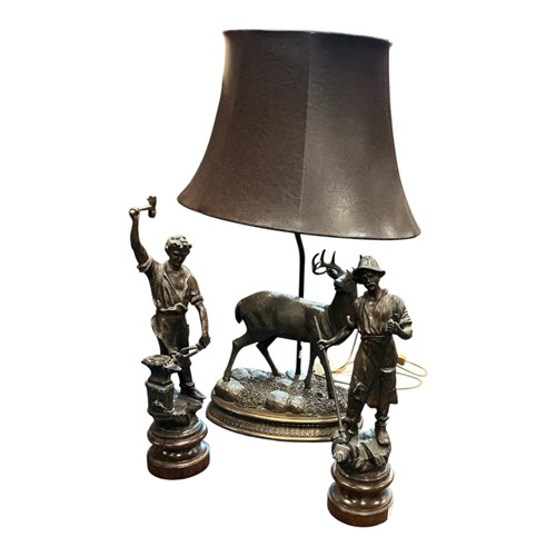 Lot 182 - A pair of spelter figures of blacksmiths, 42cm...