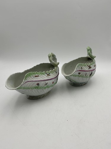 Lot 30 - Two early Worcester sauce boats, leaf moulded...