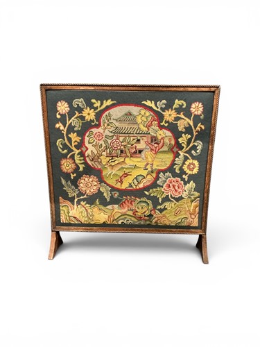 Lot 208 - Framed needlework as a firescreen, in an oak...