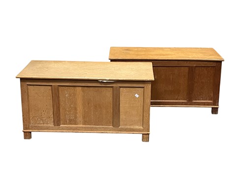 Lot 629 - Two blonde oak coffers, each with hinged lids...