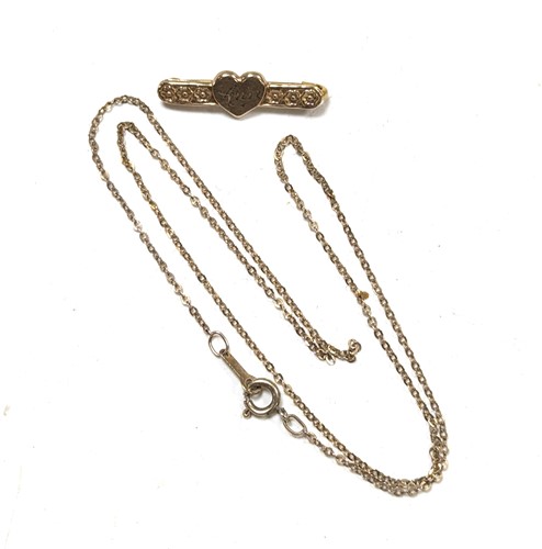 Lot 343A - A fine trace link chain (broken), stamped '9KT'...