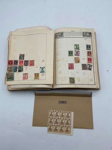 Lot 110 - An old stamp album