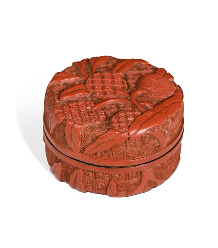 Lot 52 - A Chinese carved cinnabar lacquer box and cover, late Ming Dynasty