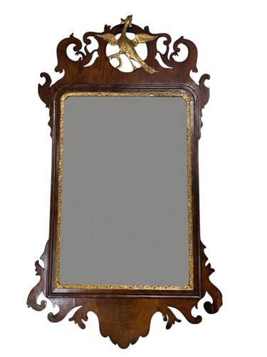Lot 762 - A Chippendale style mahogany fretwork mirror...