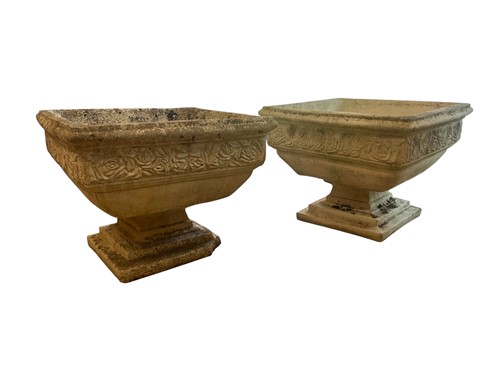 Lot 777 - A pair of composite stone garden planters,...
