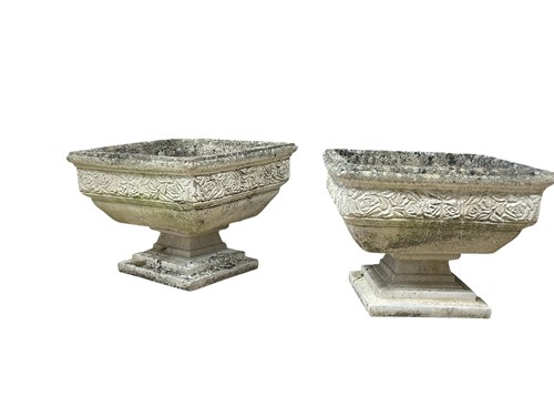 Lot 778 - A pair of composite stone garden planters,...