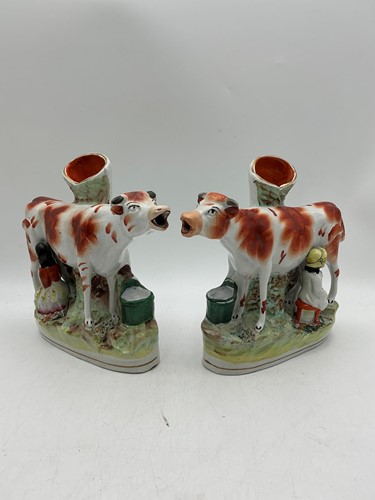Lot 12 - A pair of Staffordshire spill vases, 19th...