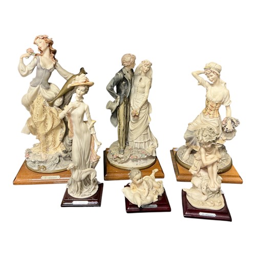 Lot 75 - A collection of Nao figures, to include ladies...