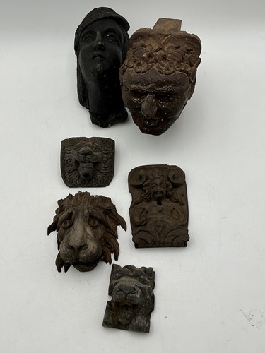 Lot 252 - Six carved wood mask mounts, some possibly...
