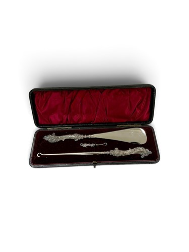 Lot 287 - A cased trio of late Victorian silver handle...