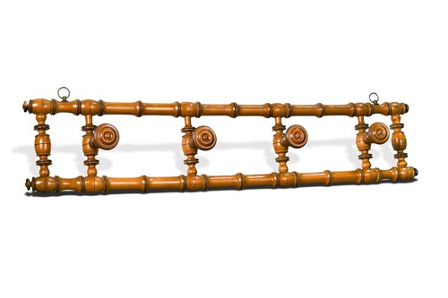 Lot 479 - A faux-bamboo wall mounted coat rack, early 20th century