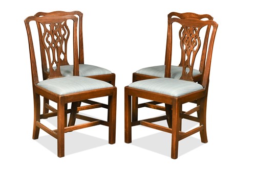 Lot 533 - A set of four George III elm dining chairs