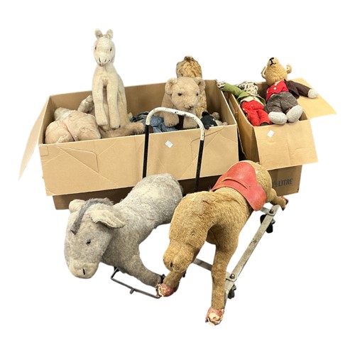 Lot 190 - A collection of vintage soft toys, including...