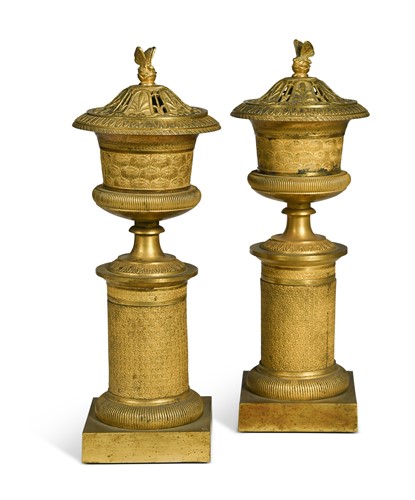Lot 484 - A pair of Neoclassical style ormolu cassolettes or candlesticks, early 19th century
