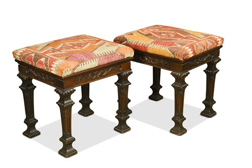 Lot 672 - A pair of kilim upholstered mahogany stools, 19th century