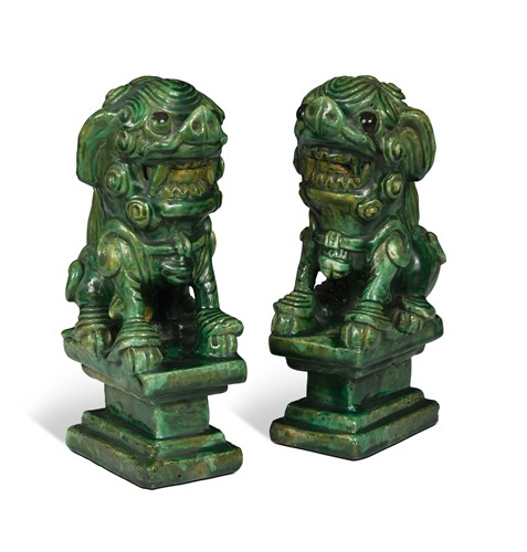Lot 45 - A pair of Chinese green glazed terracotta Fo dogs, late 19th / early 20th century