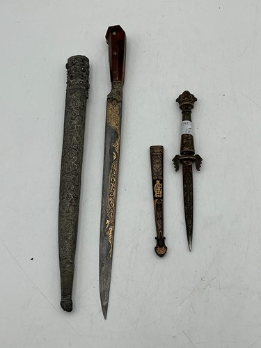 Lot 118 - A Fabrica toledo decorative paper knife inlaid...