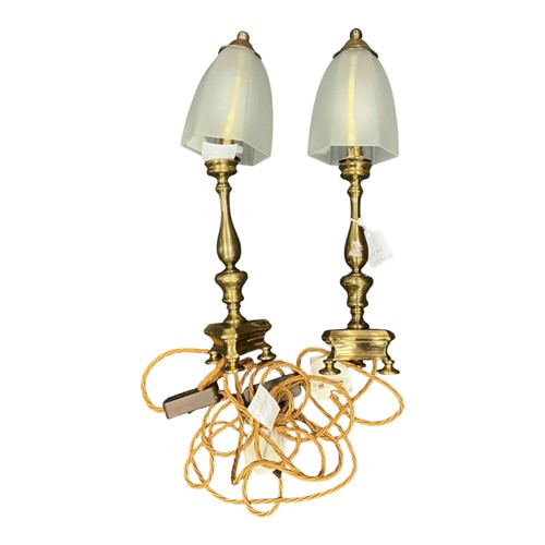 Lot 137 - A pair of brass table lamps with glass shades...