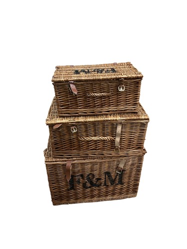 Lot 216 - Three Fortnum & Mason wicker baskets, of...