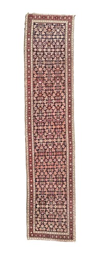 Lot 415 - A long Karabagh runner rug, circa 1910