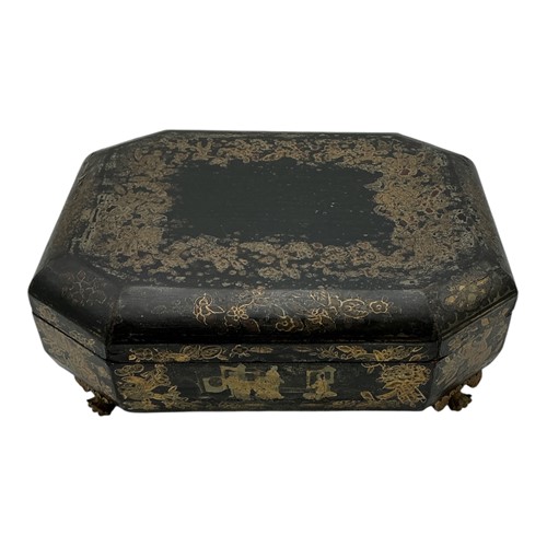 Lot 156 - A Chinese export black and gilt lacquered work...
