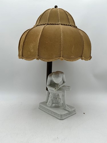 Lot 42 - A Vienna white glazed figural table lamp, late...