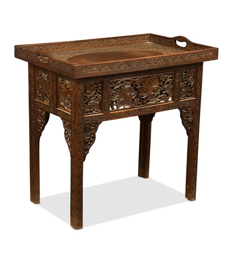 Lot 649 - An Anglo-Indian Hoshiarpur carved wood tray-top table, late 19th/ early 20th century