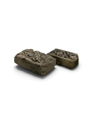 Lot 235 - Two limestone architectural bricks, decorated...