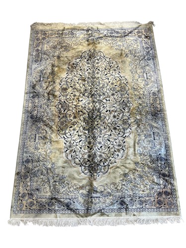 Lot 800 - A modern fine wool rug, with pale ground...