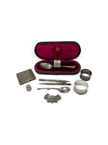 Lot 260 - A silver napkin ring and spoon, Madeira...