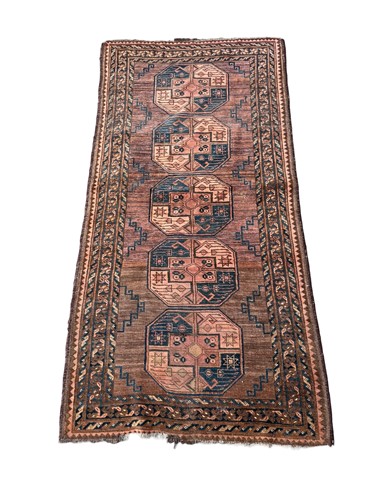 Lot 804 - A Bokhara rug, decorated with five medallions...