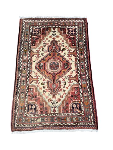 Lot 806 - A Caucasian style wool rug, modern, 131 x 82cm