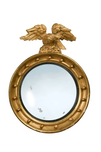 Lot 423 - A Regency giltwood convex mirror