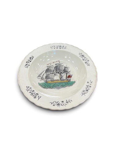 Lot 27 - A group of creamware plates to include four...