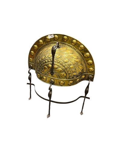 Lot 748 - An 18th century brass 'Alms dish' Couvre-Feu...