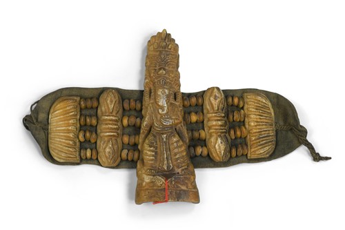 Lot 71 - A Tibetan bone apron ornament